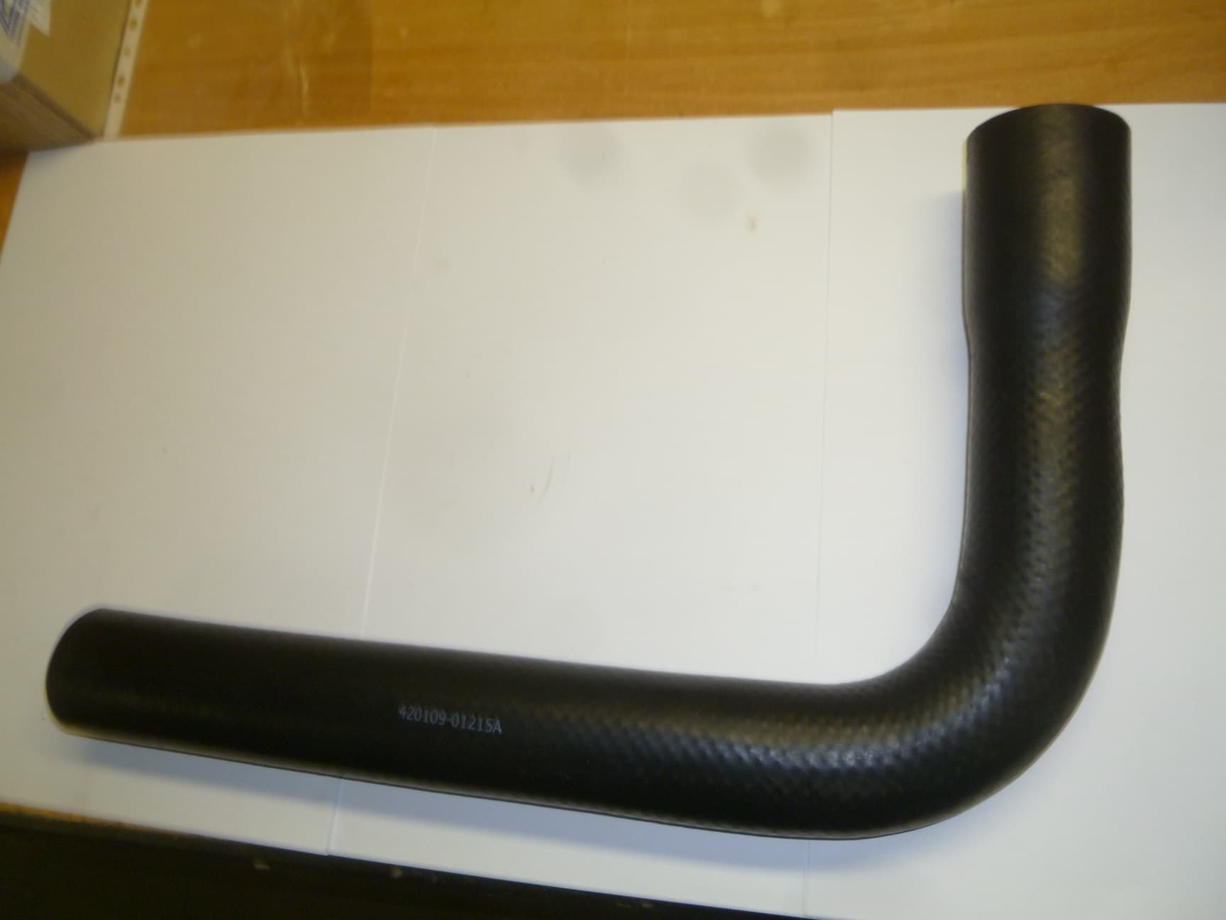 Патрубок радиатора нижний DP126LB (72х58,7х360х470) /Rubber hose, water inlet