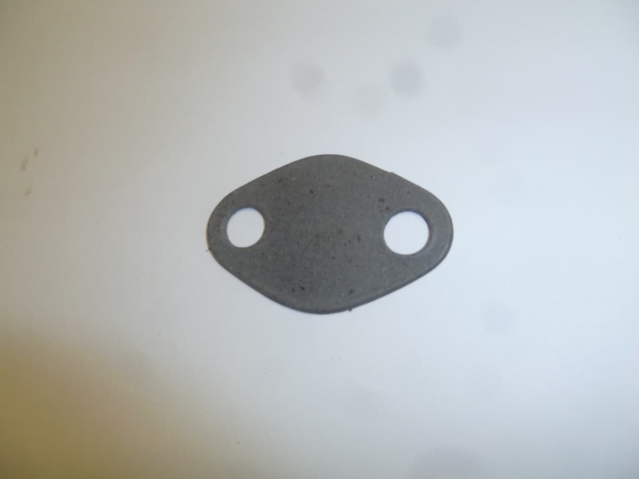 Прокладка заглушки смотрового окна крышки корпуса шестерен TDQ 38 4L/Gasket of sight glass stub  of